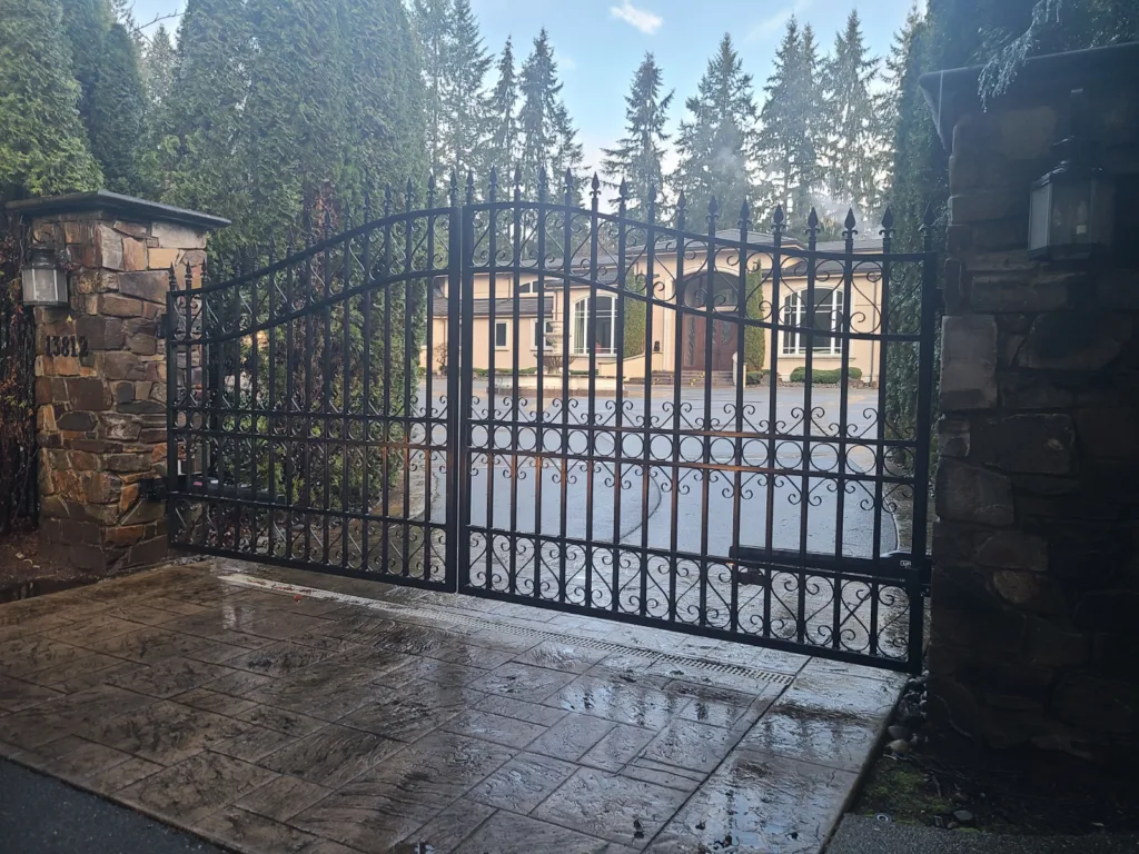 Electric gate with elegant wrought iron design