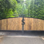 Wooden Electric gate with crest